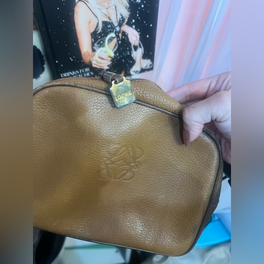 Loewe Brown Leather Pouch signs of wear on front and inside, comes with dust bag
